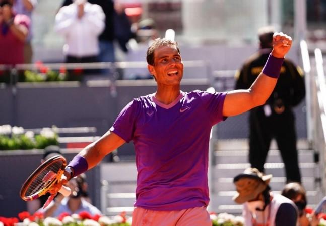 Nadal claims marathon win over Djokovic to reach 15th French Open semifinal. Nadal claims marathon win over Djokovic to reach 15th French Open semifinal.