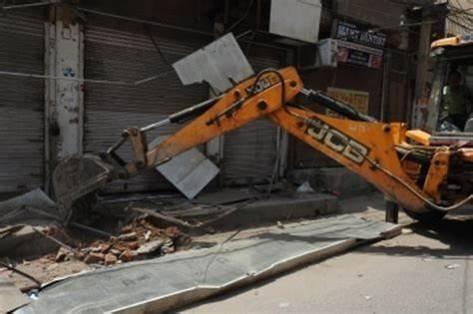 Bulldozers moved to home of Prayagraj violence accused