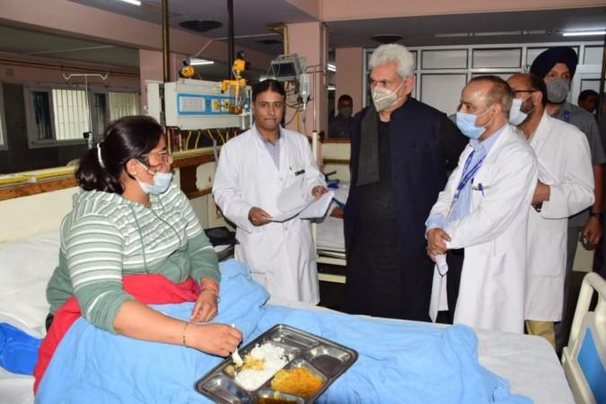 LG Manoj Sinha interacting with some injured Amarnath pilgrims LG Manoj Sinha