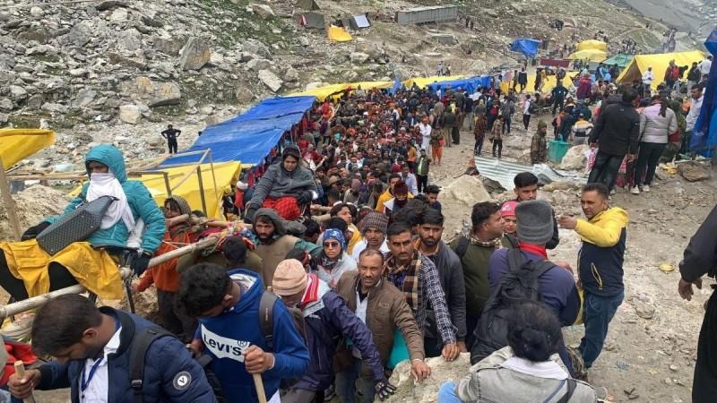 Ganderbal: Pilgrims in large numbers stand in queues during their Amarnath Yatra at Baltal in Ganderbal district on Wednesday, July 13, 2022 Amarnath yatra