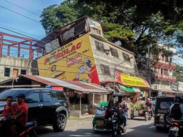 A house is seen tilting on its side after an earthquake in Abra Province, the Philippines, July 27, 2022 Earthquake in Abra Province, the Philippines