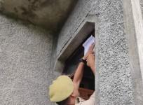 Cops seizing a house