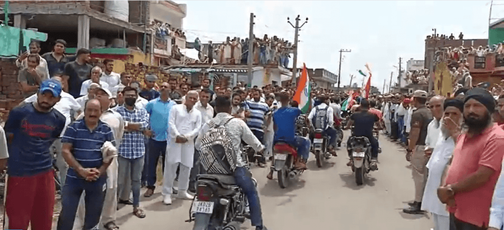 People gathered at Advitiya Bal's village