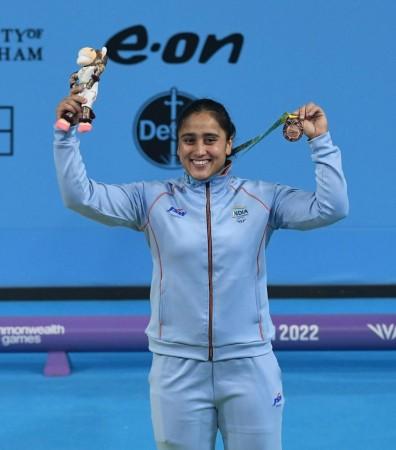 Birmingham: India's Harjinder Kaur celebrates with her bronze medal Birmingham: India's Harjinder Kaur celebrates with her bronze medal