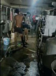 IIIT Basar students shocked after workers caught taking bath in kitchen IIIT Basar students shocked after workers caught taking bath in kitchen