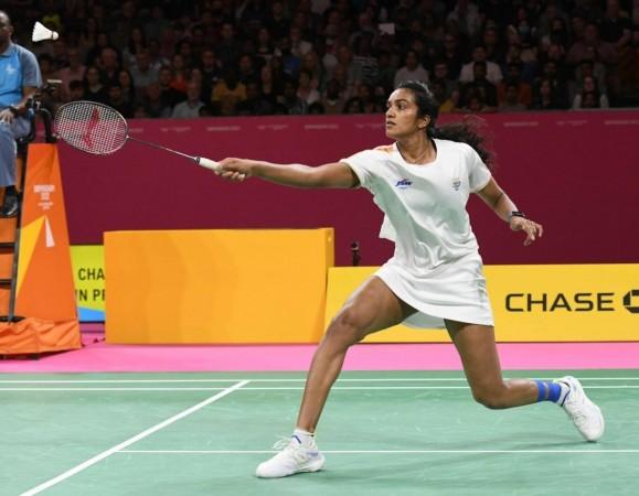 Birmingham:India's P V Sindhu in action against Canada's Michelle Li during their Women's single gold medal badminton match at the Commonwealth Games in Birmingham, England, Monday, Aug. 8, 2022. India's P V Sindhu won gold medal in Commonwealth Games in Birmingham