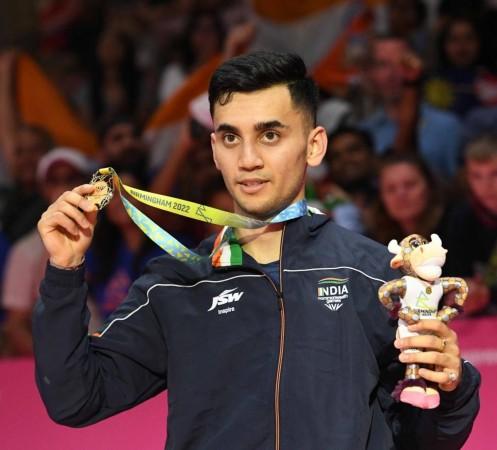 Birmingham:India's Lakshya Sen poses with his gold medal in the Men's singles badminton at the Commonwealth Games in Birmingham, England, Monday, Aug. 8, 2022 India's Lakshya Sen