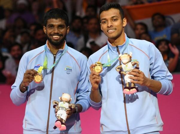 Birmingham: Gold Medalists Satwiksairaj Rankireddy and Chirag Shetty pose with their medal after winning the Men's Doubles Final Badminton match against England's Ben Lane and Sean Vendy at the Commonwealth Games 2022, in Birmingham, England on Mondays, August 08, 2022. Satwiksairaj Rankireddy and Chirag Shetty