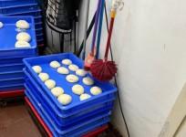 Hanging of toilet brushes on pizza dough at bengaluru Dominos outlet