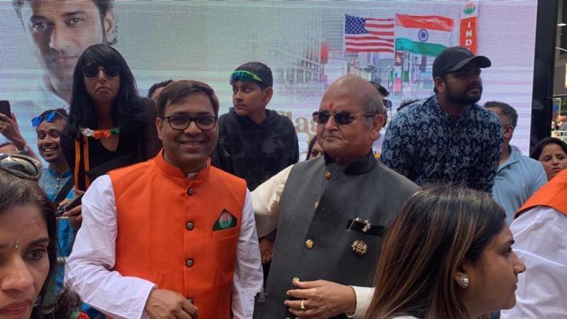 Alok Kumar, former FIA president and current chief co-ordinator for Hyderabad Mega camp, with FIA convenor Prem Bhandari at NY's Times Square Independence Day celebration at NY's Times Square