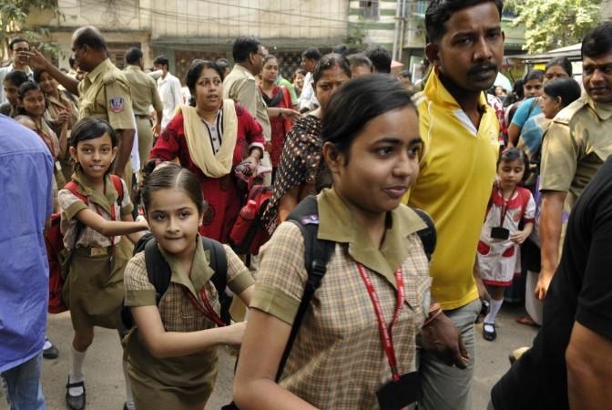 Students of Christ Church Girls School which reopened 15 days in Kolkata on Sept. 27, 2013.The school was closed following the death of a 11 year old student of the school.(File Photo) Students of Christ Church Girls School