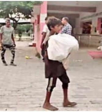 Denied ambulance, 10-yr-old boy carries dead brother's body from hospital in Uttar Pradesh Ambulance denied
