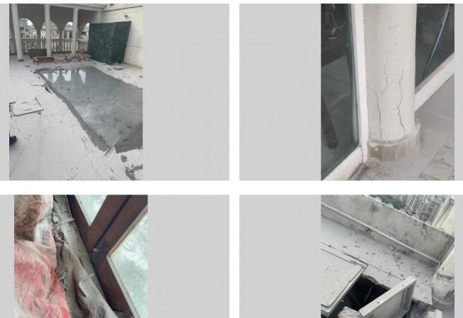 Twin Towers: Flat's broken windows, balconies and pillars cracked due to explosion. Flat's broken windows, balconies and pillars cracked due to explosion.
