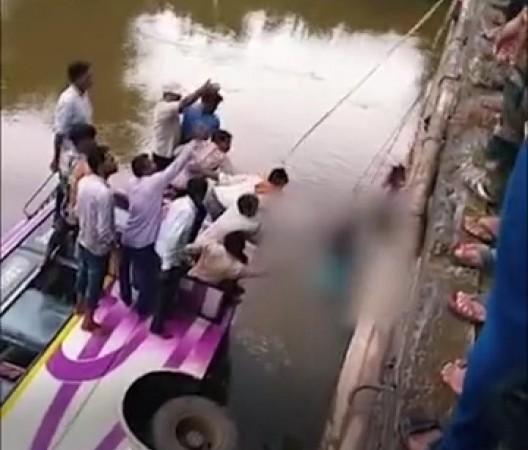 Two dead, 20 injured after bus falls into river in MP's Khandwa. Two dead, 20 injured after bus falls into river in MP's Khandwa.