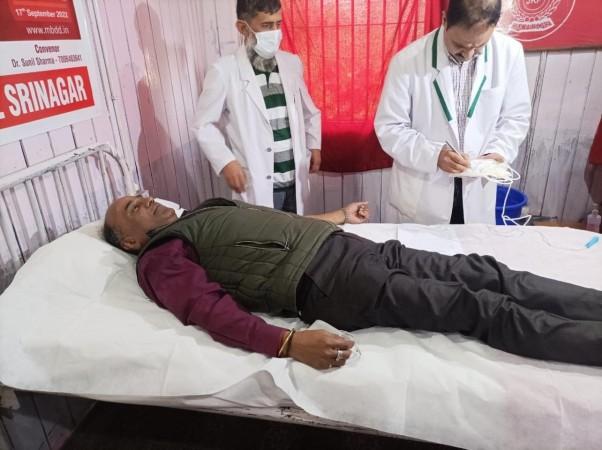 Director General Prisons J&K H K Lohia donating blood at Central Jail Srinagar to launch DG Prisons H K Lohia