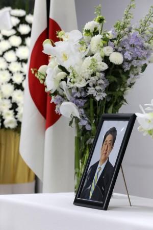 Seoul : A portrait of the late Japanese Prime Minister Shinzo Abe is displayed at an memorial altar for him at the Japanese Embassy's public information and cultural center in Seoul on July 11, 2022.(Photo:Yonhap/IANS) Shinzo Abe