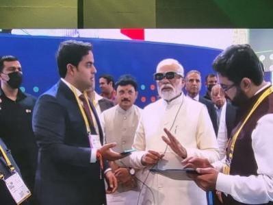 Modi drives 5G-enabled remote car, experiences AR-VR wearables Modi drives 5G-enabled remote car, experiences AR-VR wearables
