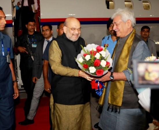 Jammu and Kashmir Lieutenant Governor Manoj Shah receiving Union Home Minister Amit Shah at Jammu airport on Monday evening. Home Minister