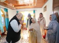 Amit Shah meets family of slain policeman in Uri; visits officer's grave