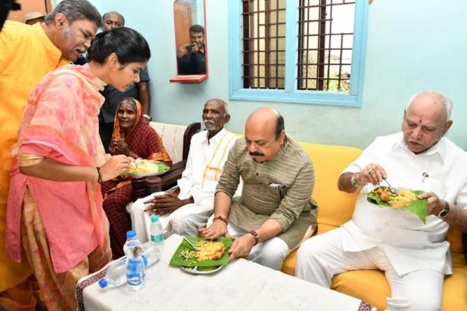 Bommai, Yediyurappa have breakfast at Dalit home Bommai, Yediyurappa have breakfast at Dalit home