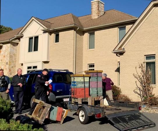 The trailer carrying the bee hive towers Bees