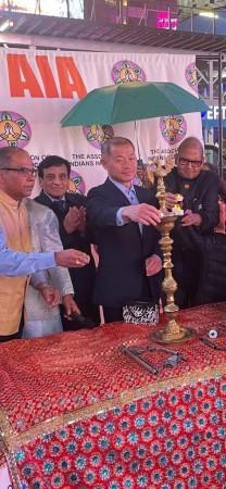 Srinivas Ranga, Corporate Vice President at New York life insurance company, Dr. Samin Sharma, John Liu, New York State senator, and Prem Bhandari light the lamp. Srinivas Ranga, Corporate Vice President at New York life insurance company, Dr. Samin Sharma, John Liu, New York State senator, and Prem Bhandari lit the lamp during the inaugural ceremony at Times Square.