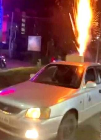 K'taka youth arrested for bursting sky shot crackers from moving car. K'taka youth arrested for bursting sky shot crackers from moving car.