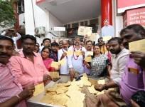 Telangana weavers send postcards to PM.