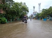 Chennai:Commuters wade through flooded road during heavy rains in Chennai on Tuesday November 01,2022