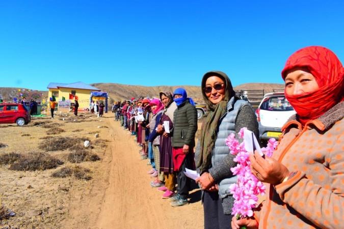 Voters standing in a queue outside world's highest polling station in Himachal Pradesh Poling Himachal Pradesh