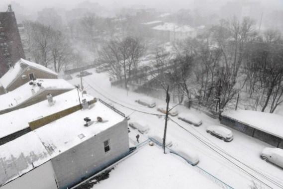 A man walks on a snow-covered road in New York, the United States, on Feb. 1, 2021. A man walks on a snow-covered road in New York, the United States, on Feb. 1, 2021.