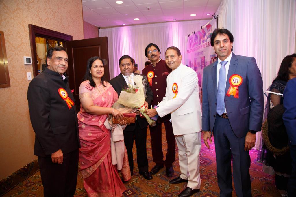 RANA Vice President giving flowers to Mrs Randheer Jaiswal