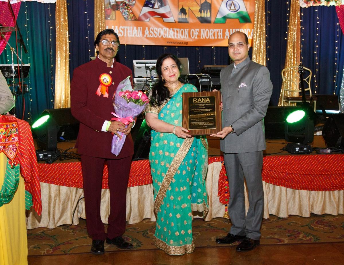 Dr Sadhna Joshi from Canada being awarded by Dr Varun Jeph, Deputy Counsel General of India, New York