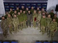 Zelensky visits troops in Donetsk.