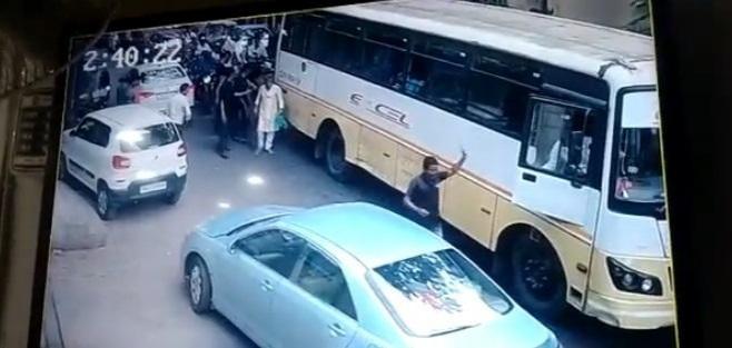 Mumbai: Man knocked down, 'run over' by bus, walks up to a miraculous escape!. Mumbai: Man knocked down, 'run over' by bus, walks up to a miraculous escape!.