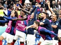 Al Khor : French players celebrate at the end of the World Cup quarter final football match between England and France, at the Al Bayt Stadium in Al Khor, Qatar on Sunday, December 11, 2022.