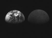 This photo of Earth (L) and the moon is taken by a camera onboard South Korean lunar orbiter Danuri on Nov. 28, 2022, and provided by the Ministry of Science and ICT