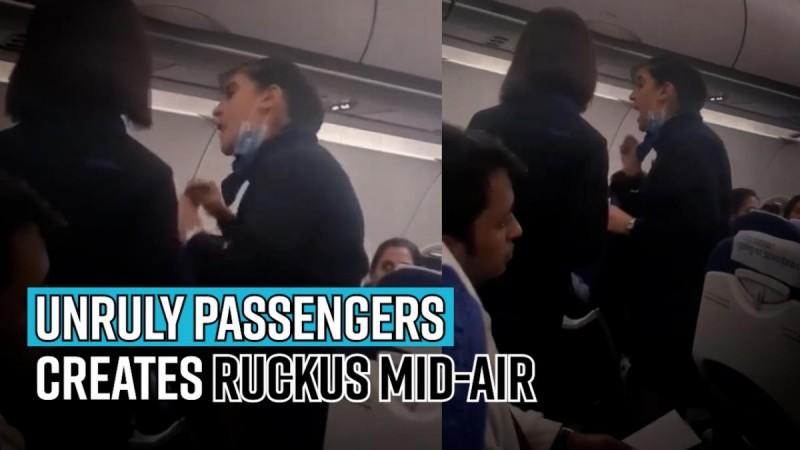 Unruly passengers creates ruckus mid-air; video of altercation with crew goes viral