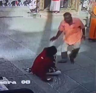 Woman dragged, beaten in temple in K'taka; video goes viral Woman dragged, beaten in temple in K'taka; video goes viral