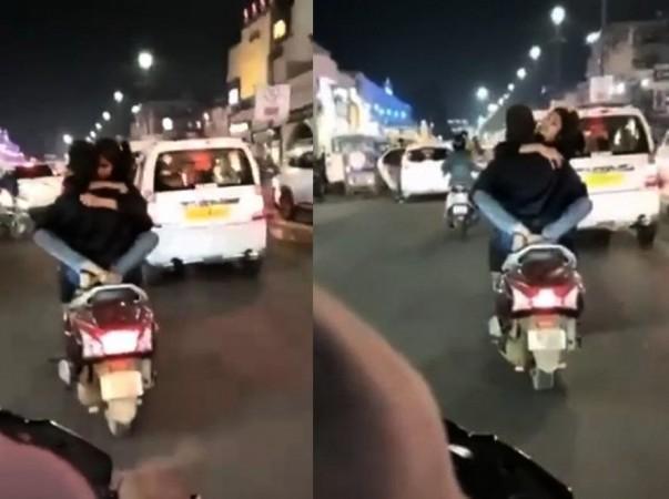 Cops search for couple on two wheeler. Lucknow scooter video