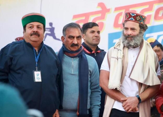 The flag handover ceremony was held in the border village of Ghatota in Himachal Pradesh as Punjab Congress handed it over to the hill state's leaders. (Photo: Twitter/@INCIndia) Bharat Jodo Yatra