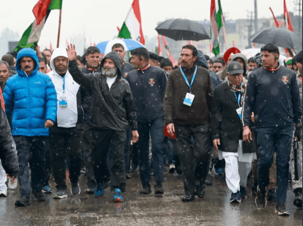 Rahul Gandhi wearing waterproof raincoat during Bharat Jodo Yatra in Kathua district of Jammu and Kashmir. Bharat Jodo Yatra