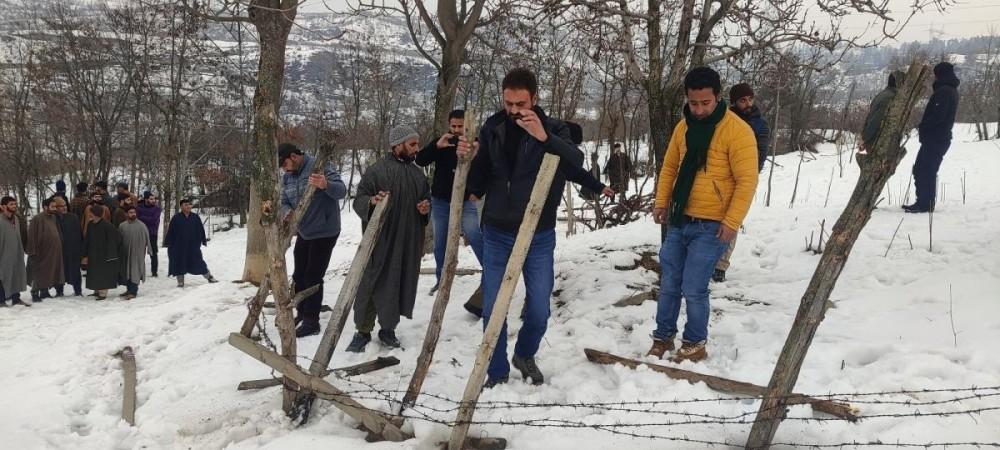 An anti encroachment drive is underway at a hilltop in Baramulla on Saturday An anti encroachment drive is underway at a hilltop in Baramulla on Saturday