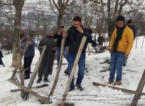 An anti encroachment drive is underway at a hilltop in Baramulla on Saturday