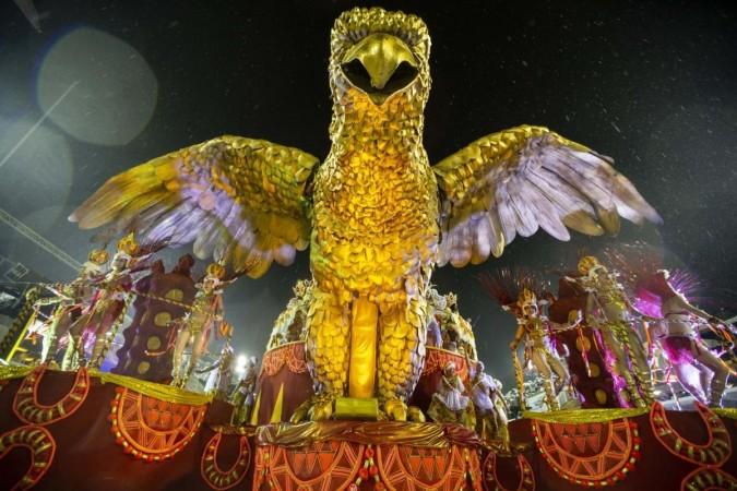 Revelers perform on a float during the parades of the Carnival at the Sambadrome in Rio de Janeiro, Brazil, on March 2, 2019. The Rio Carnival 2019 was postponed by one hour on Friday because of the heavy rain (File photo) Revelers perform on a float during the parades of the Carnival at the Sambadrome in Rio de Janeiro, Brazil.