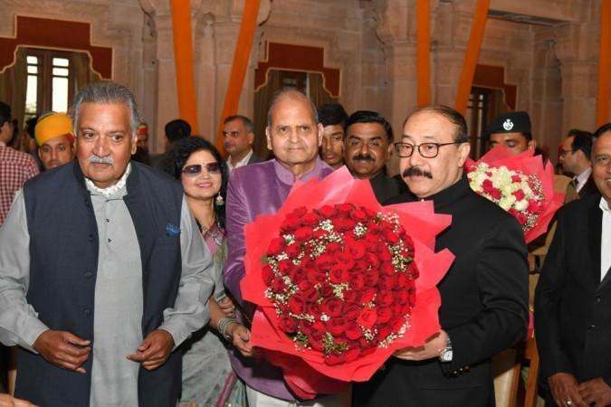 In Picture: Prem Bhandari presenting flowers to Harsh Vardhan Shringla In Picture: Prem Bhandari presenting flowers to Harsh Vardhan Shringla