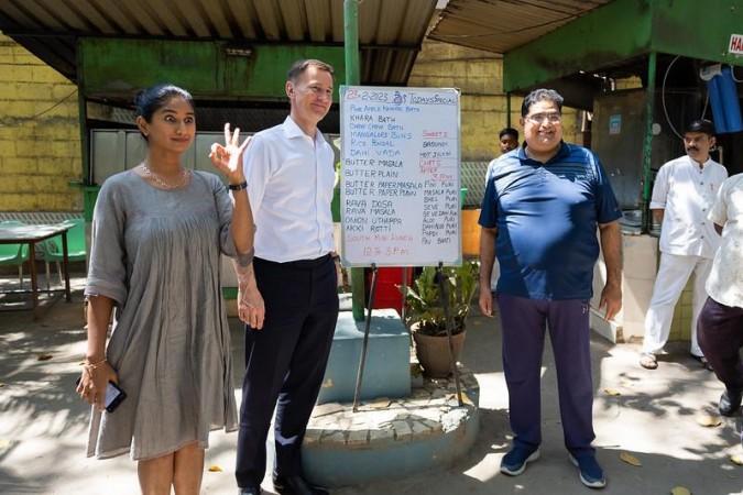 The Chancellor Jeremy Hunt is interviewed by social media influencer Shraddha Jain at Airlines hotel in Bengaluru.