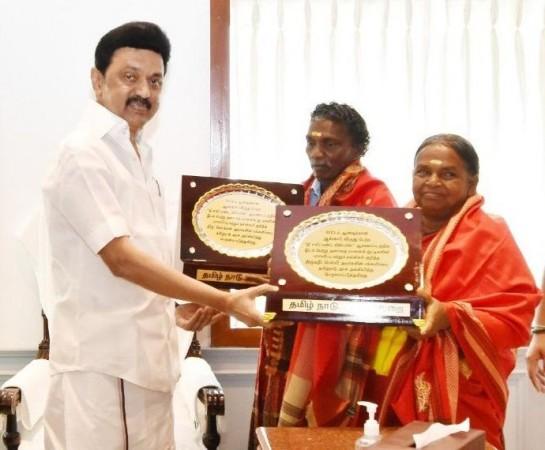 Stalin felicitates elephant whisperers Bomman and Bellie. Stalin felicitates elephant whisperers Bomman and Bellie
