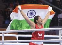 India's Saweety Boora celebrates her win over China's Wang Lina during the final match in 81 kg category at the 2023 IBA Women's Boxing World Championships in New Delhi