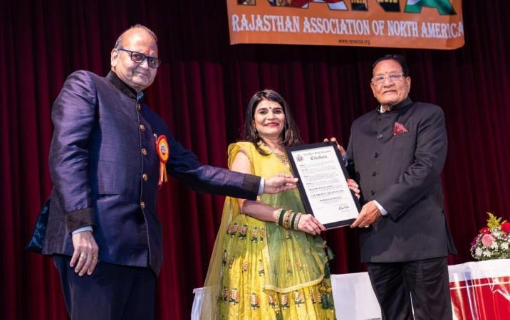 Minister Shanti Kumar Dhariwal receives NY state assembly citation at RANA event in NY. Prem Bhandari presents honour. Minister Shanti Kumar Dhariwal felicitated at RANA event in NY